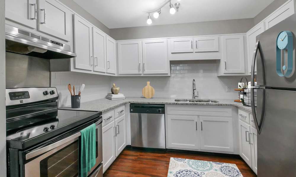 Kitchen with updated cabinets at The Grand Apartments in CHATTANOOGA, Tennessee