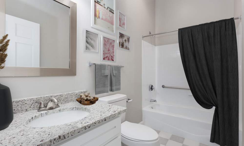Bathroom with great lighting at The Grand Apartments in CHATTANOOGA, Tennessee