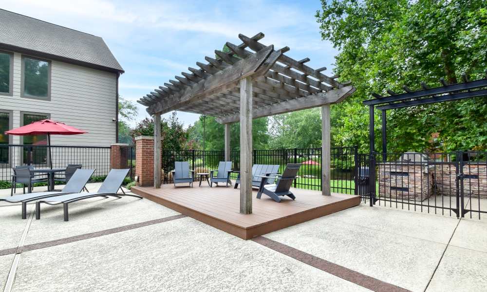 Lounge beds at swimming pool at Park Laureate Apartments & Townhomes in Louisville, Kentucky, 