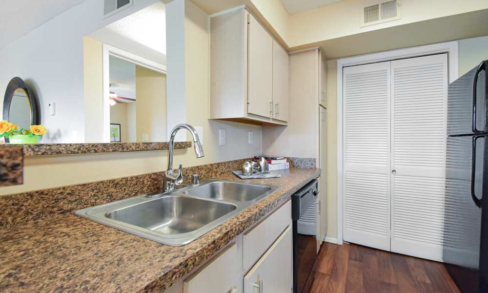 Island kitchen at Park Laureate Apartments & Townhomes in Louisville, Kentucky, 