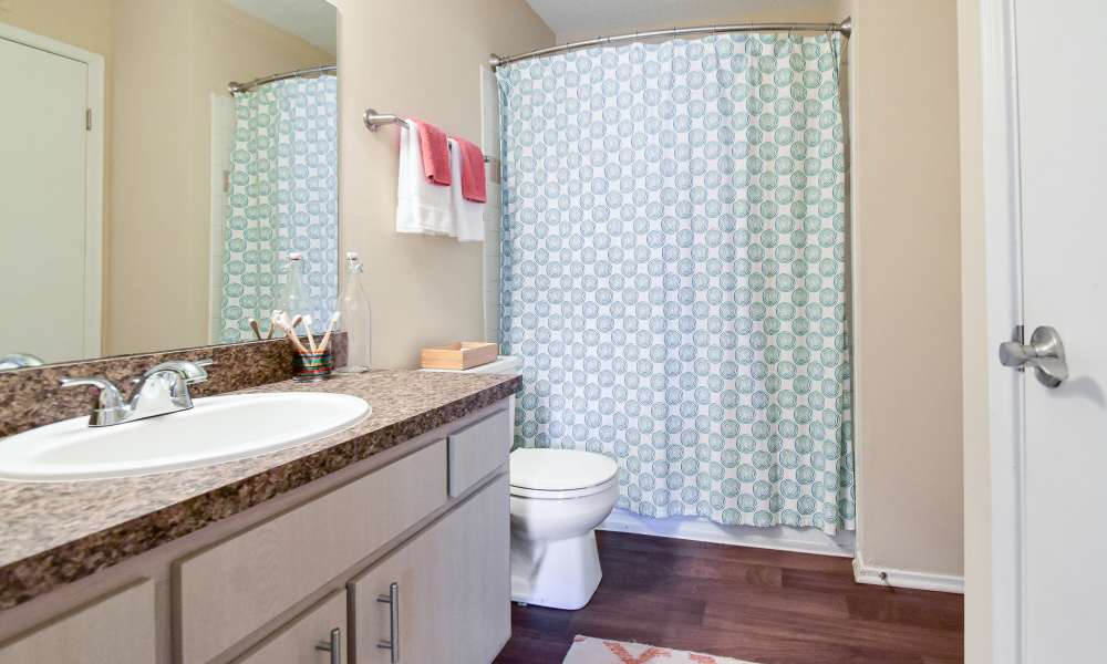Bright bathroom at Park Laureate Apartments & Townhomes in Louisville, Kentucky, 