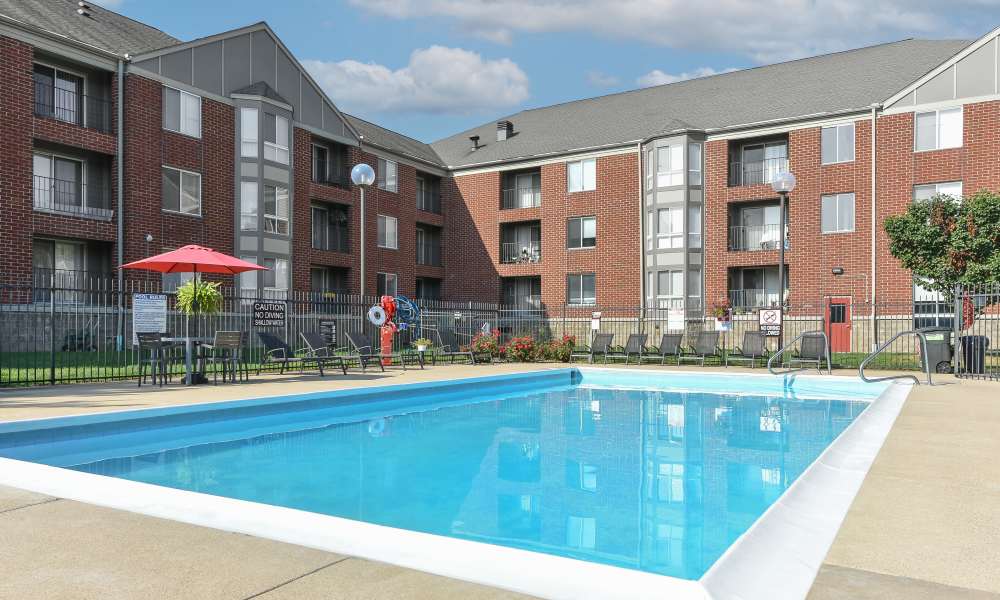 Pool view of  the building at The Pointe at St. Joseph Apartment Homes in South Bend, Indiana