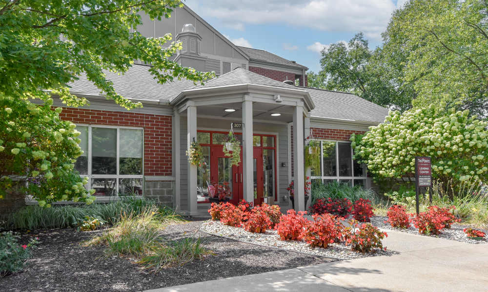Front entry of the building at The Pointe at St. Joseph Apartment Homes in South Bend, Indiana