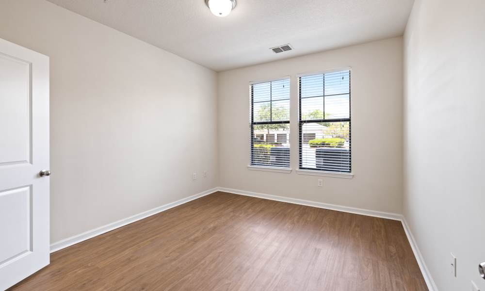 Bedroom with big window at The Hawthorne in Jacksonville, Florida