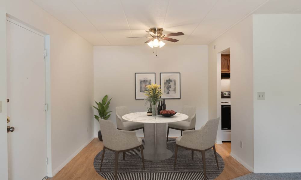 Dining area with a ceiling fan at Vantage Pointe West Apartment Homes in Cincinnati, Ohio