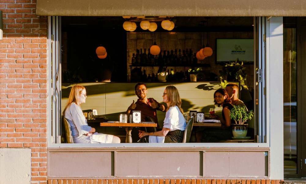 Residents enjoying dining near Flats At 540 in Apex, North Carolina