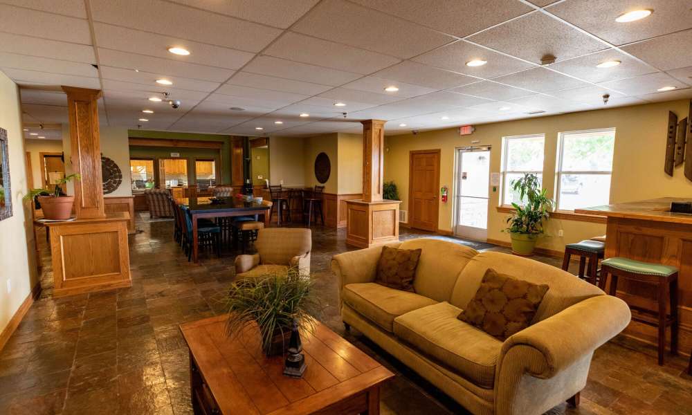 Clubhouse with seating and dining area at Windscape Apartments in Hobbs, New Mexico