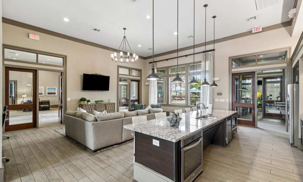 View of clubhouse seating area from the prep kitchen at Plantation Park Apartments in Lake Jackson, Texas