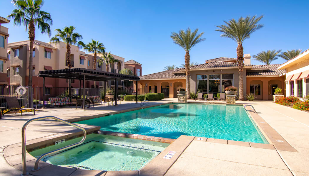 Resort-style swimming pool at The Residences at Stadium Village in Surprise, Arizona