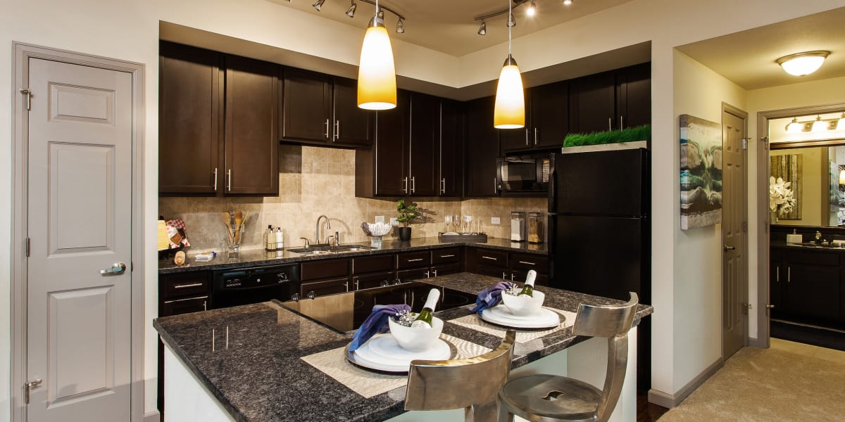 Spacious kitchen and dining area at Harvest Station Apartments in Broomfield, Colorado