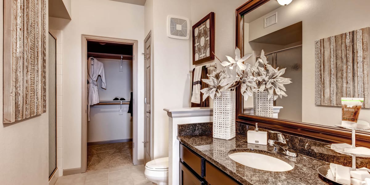 Huge bathroom with nice vanity mirror at Harvest Station Apartments in Broomfield, Colorado