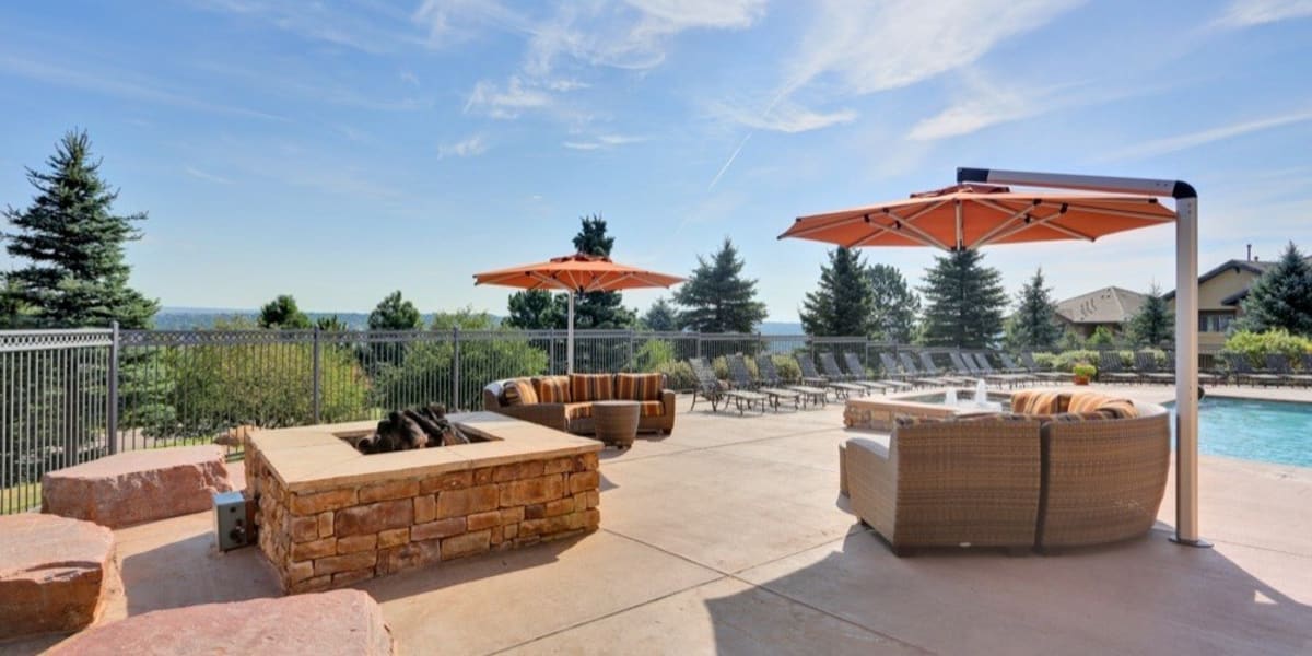 Poolside firepit and cabanas at Resort at University Park in Colorado Springs, Colorado