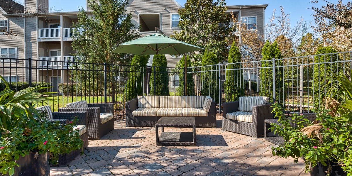 Outdoor patio and lounge area at The Reserve at Ballenger Creek Apartments in Frederick, Maryland