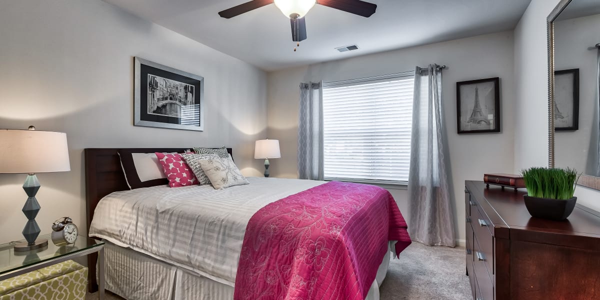 Spacious bedroom with a ceiling fan at The Reserve at Ballenger Creek Apartments in Frederick, Maryland