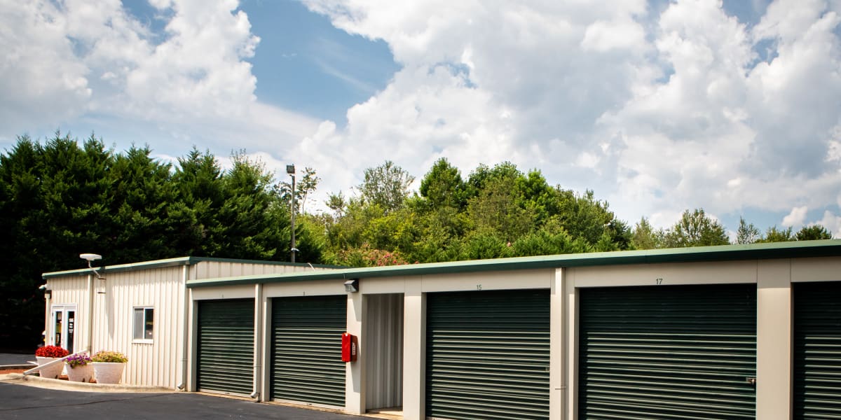 green doors on outdoor units  at AAA Self Storage at Pleasant Ridge Rd in Greensboro, North Carolina