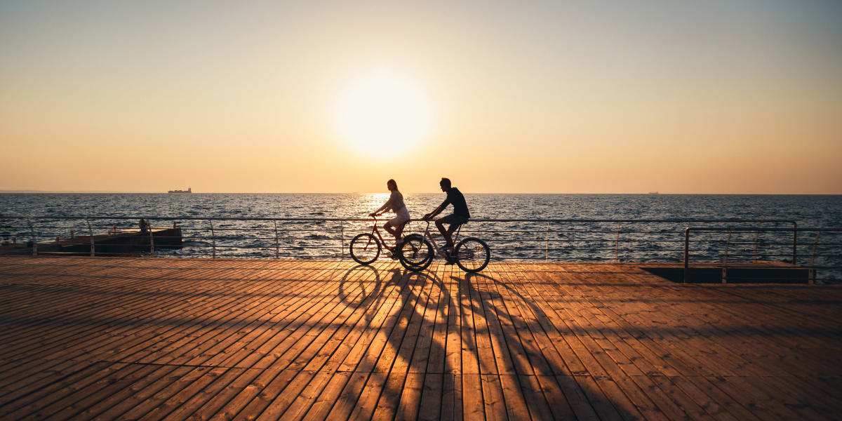 Residents riding bikes near the ocean in Marysville, Washington near Westend