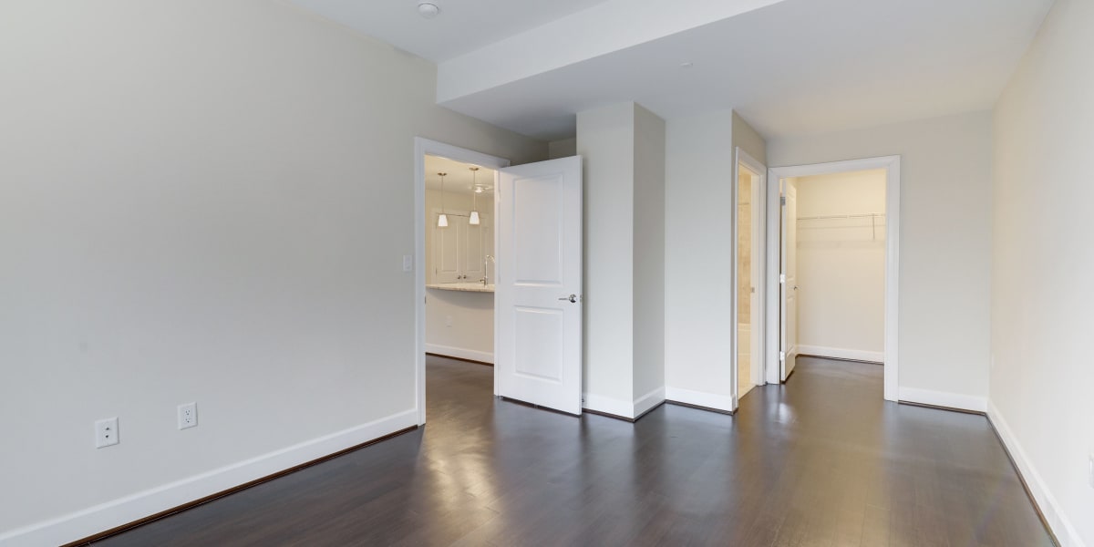 Gorgeous hardwood style flooring and white walls at 700 Constitution in Washington, District of Columbia