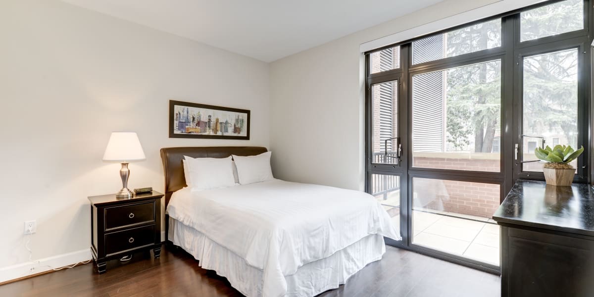 Gorgeous bedroom with floor to ceiling windows for tons of light at 700 Constitution in Washington, District of Columbia