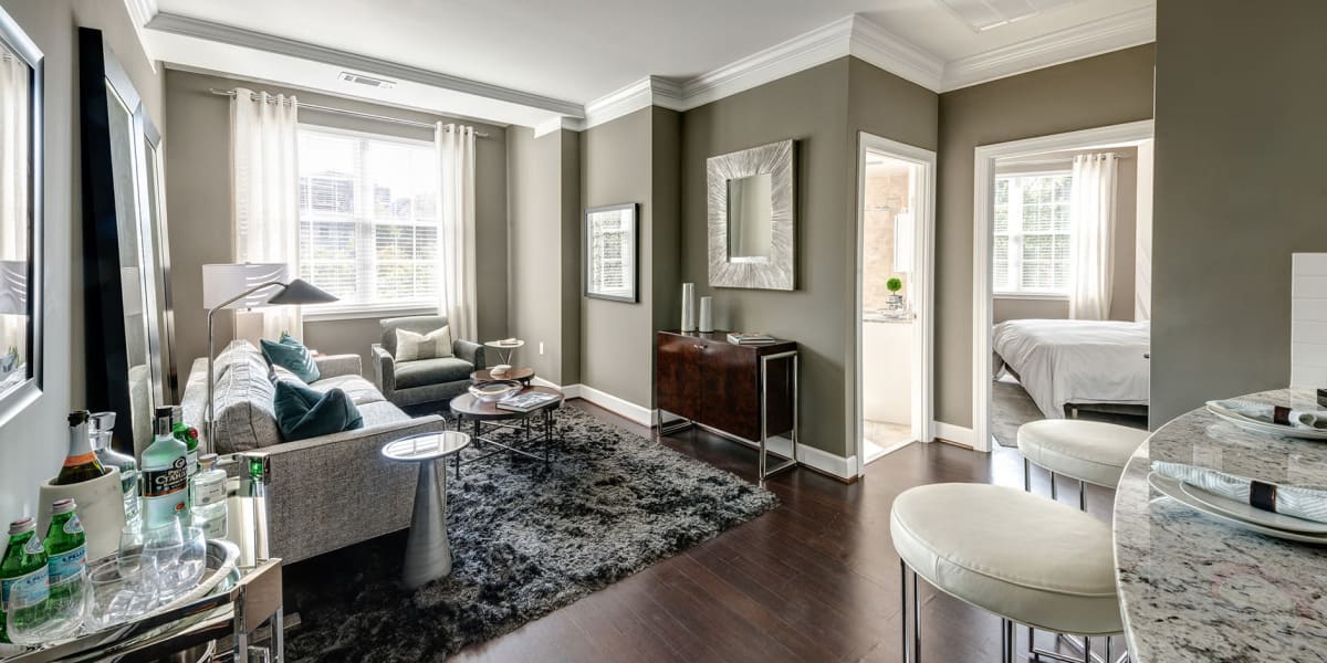 Very spacious living room area with tons of natural light and hardwood floors at 700 Constitution in Washington, District of Columbia