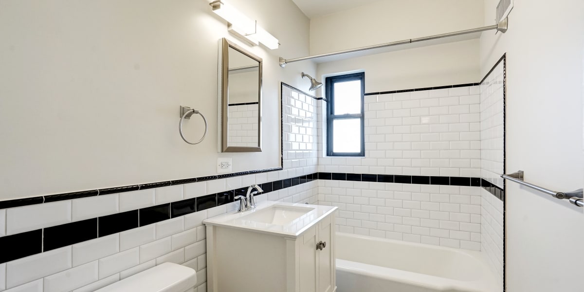 Bathroom with window for some natural light while you get ready at Dorchester House in Washington, District of Columbia