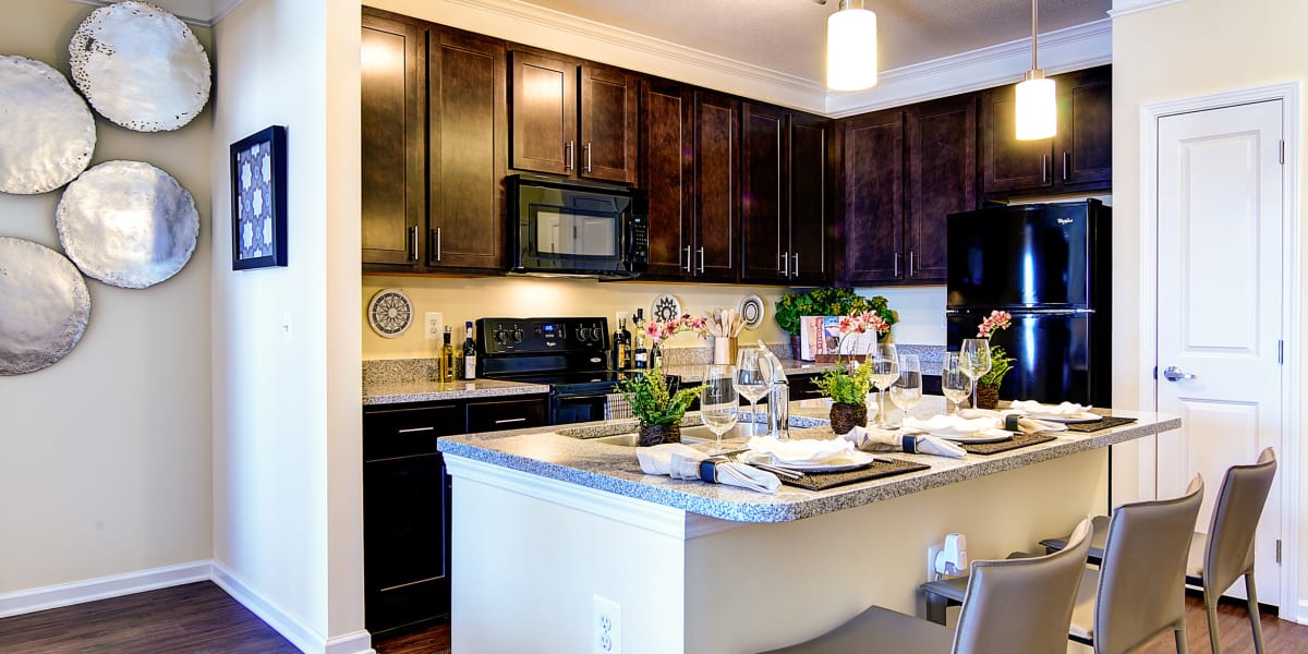 Breakfast bar at the island in the kitchen at The Retreat at Market Square in Frederick, Maryland