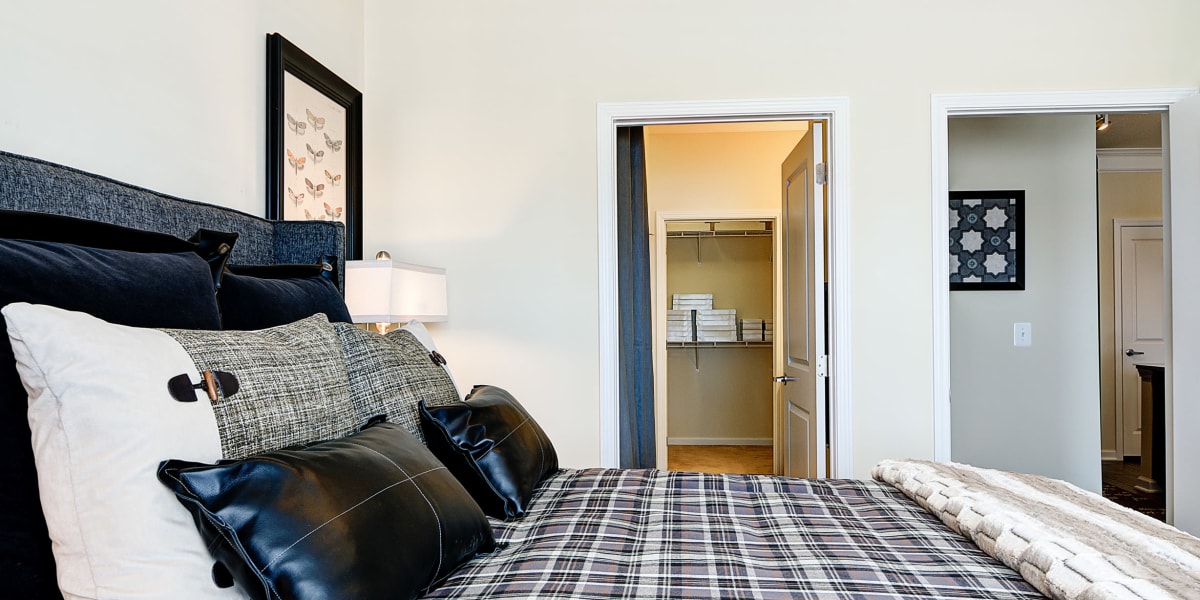 Bedroom with a large closet that gives you tons of storage space at The Retreat at Market Square in Frederick, Maryland