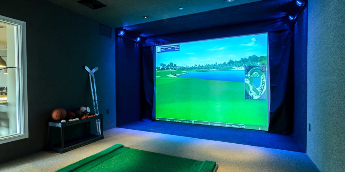 Virtual gaming room with golf and other sports at The Retreat at Market Square in Frederick, Maryland