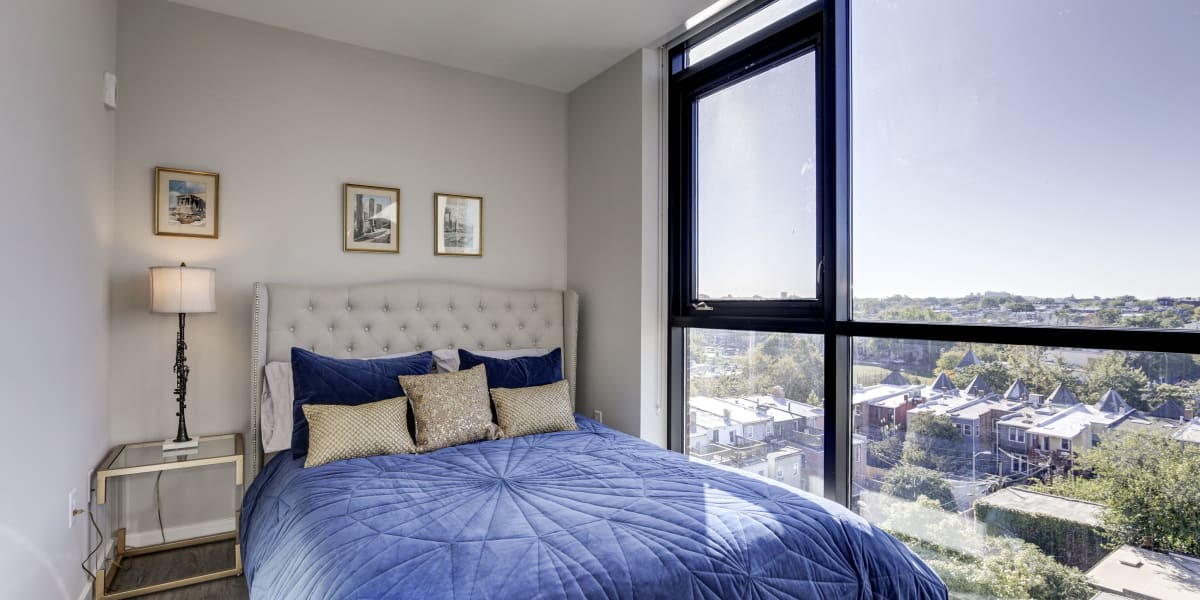 Spacious bedroom with floor to ceiling windows and great views at 501 H Street in Washington, District of Columbia