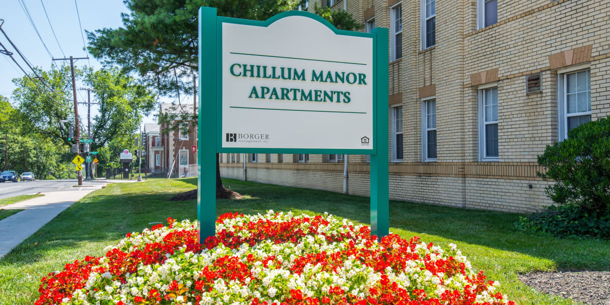Exterior apartment welcoming sign at Chillum Manor in Washington, District of Columbia