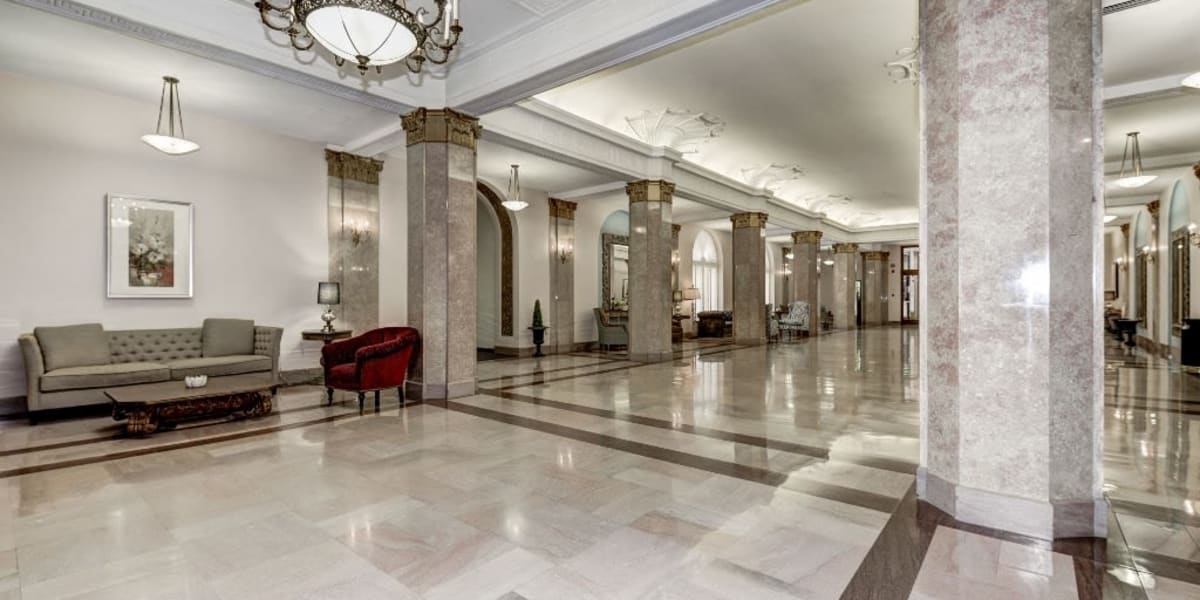 Huge lobby area with nice tile flooring at The Envoy Apartments in Washington, District of Columbia