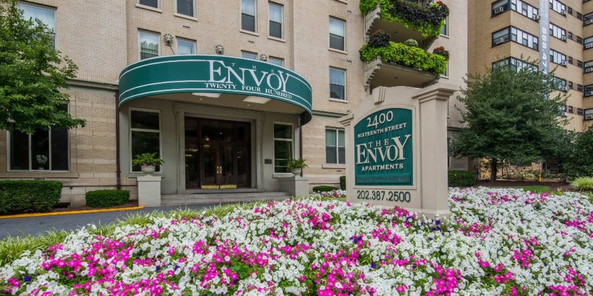 Beuatiful bed of flowers in front of the building at The Envoy Apartments in Washington, District of Columbia