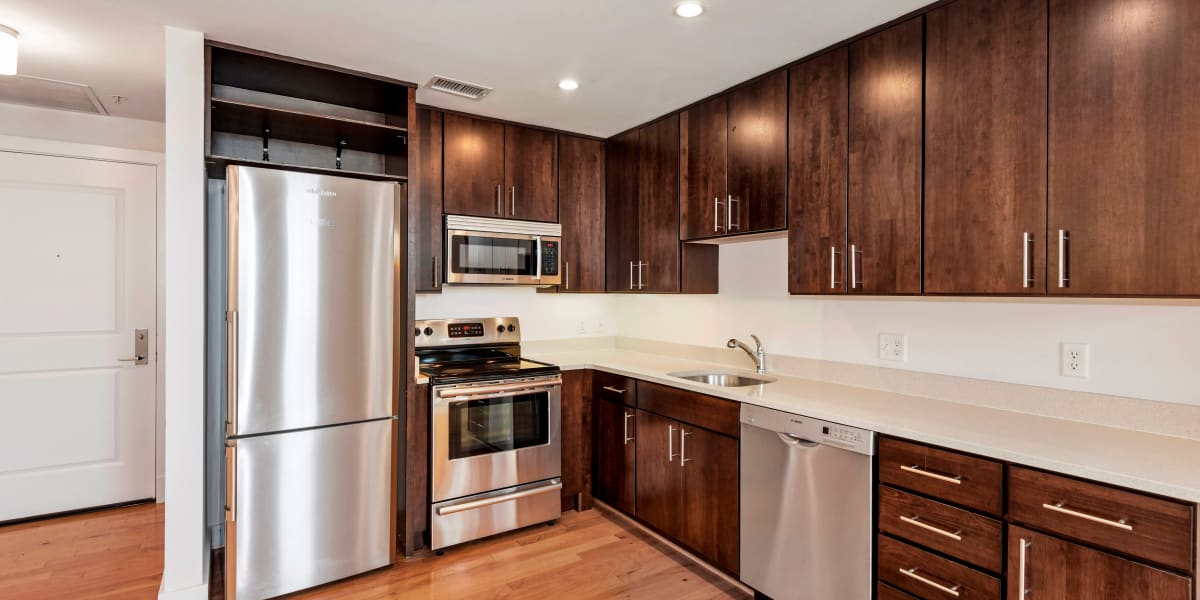 Stainless steel appliances in the modern and sleek kitchen at Griffin Apartments in Washington, District of Columbia
