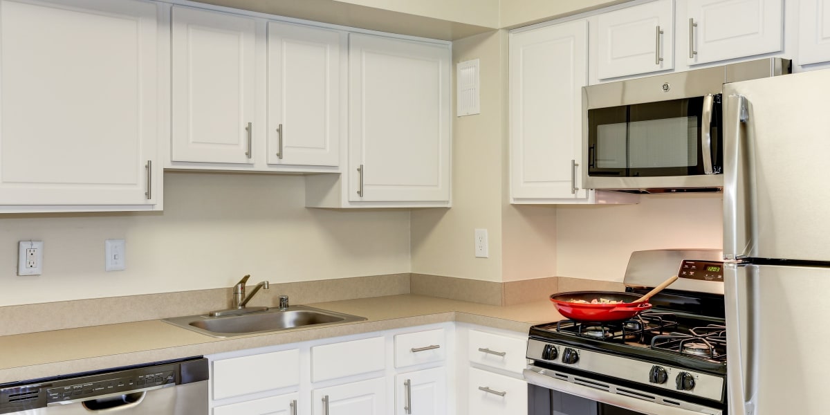 Lots of counter space next to the nice stainless steel appliances at Mayfair House in Falls Church, Virginia