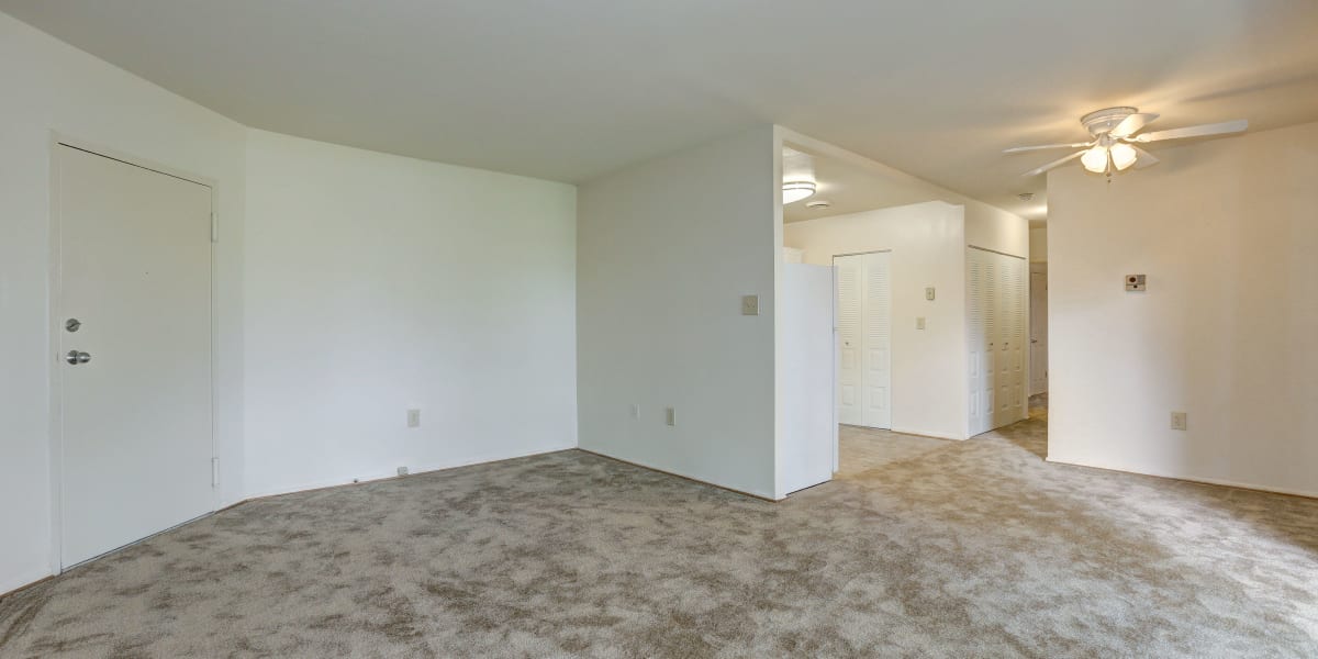 Cozy carpeted floors in the living area of an unfurnished home at Parkway Plaza in Washington, District of Columbia