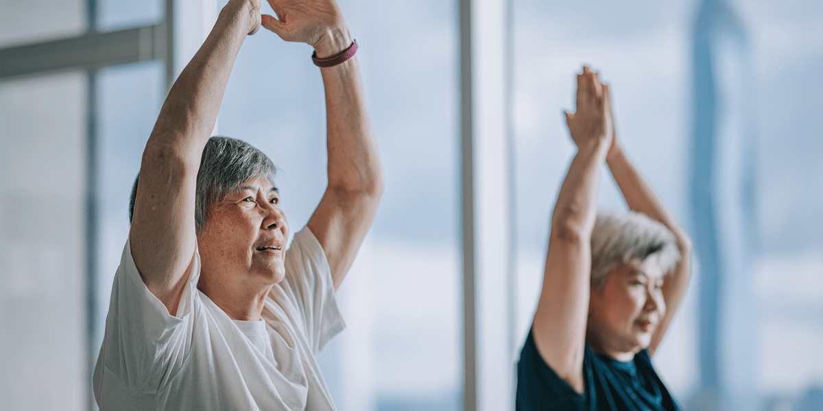 Residents at a yoga class at a Arcadia Communities community