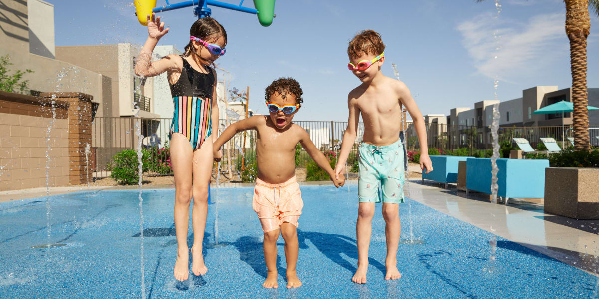 Lovely kids enjoying their time in swimming pool at BB Living at Val Vista in Gilbert, Arizona