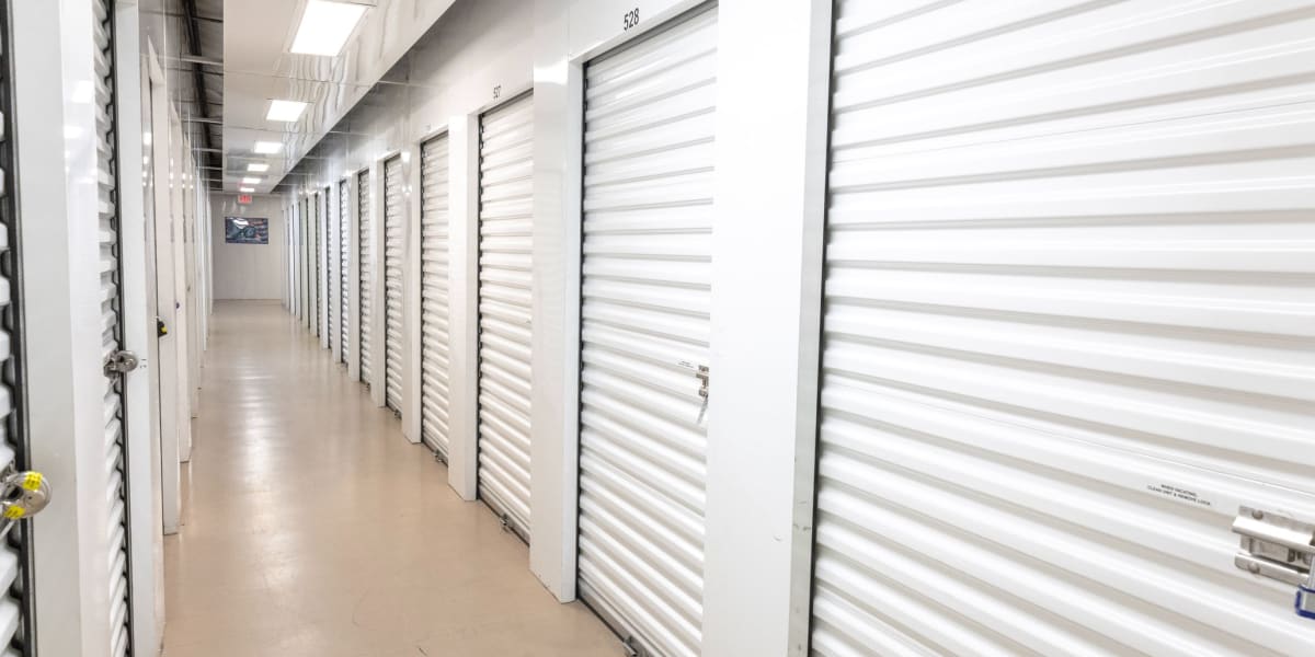 A row of indoor storage units at Avid Storage in Humble, Texas