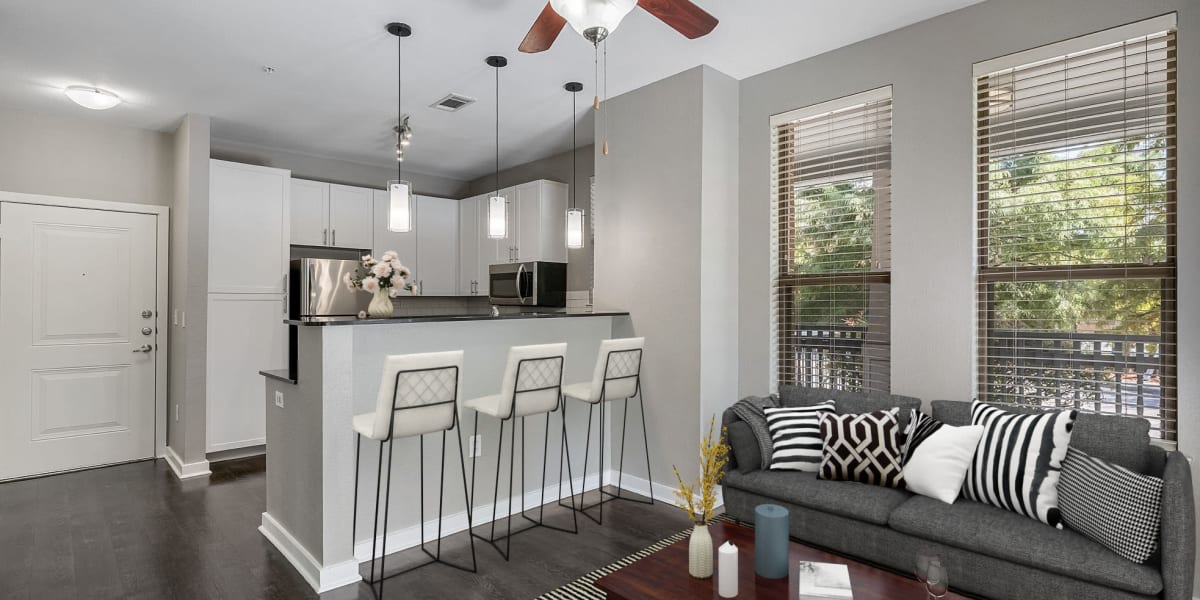 Kitchen and living room at The Marquis of State Thomas in Dallas, Texas