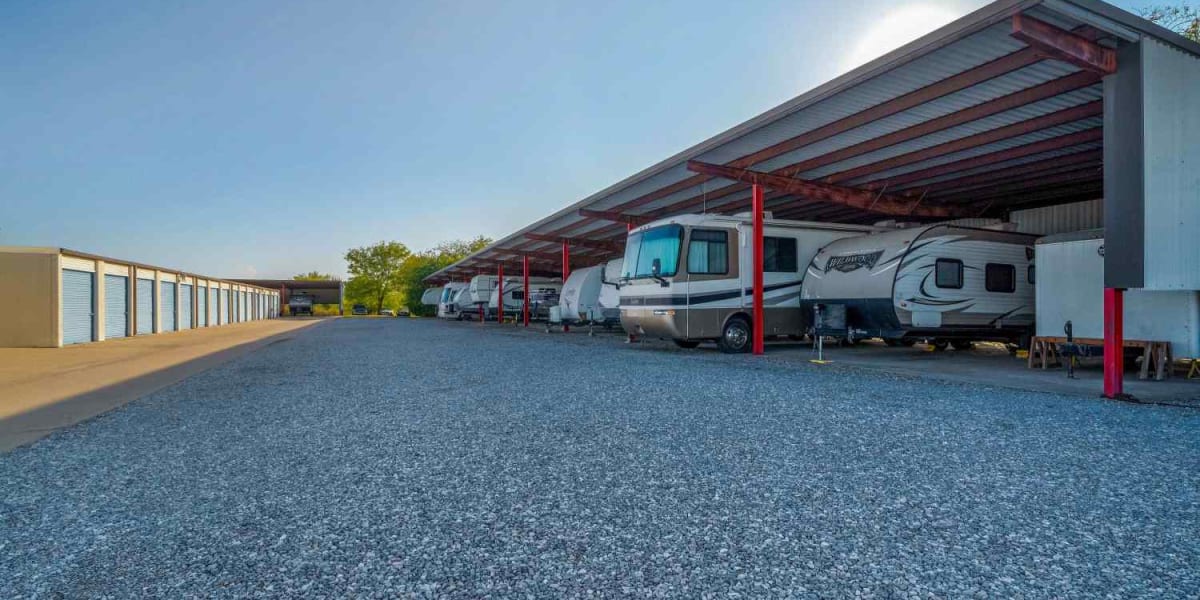 Outdoor storage units and covered RV, boat, and car parking at StoreLine Self Storage in Wichita Falls, Texas