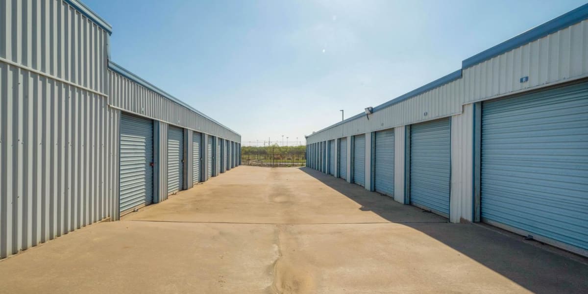 Wide driveway between outdoor storage units at StoreLine Self Storage in Wichita Falls, Texas