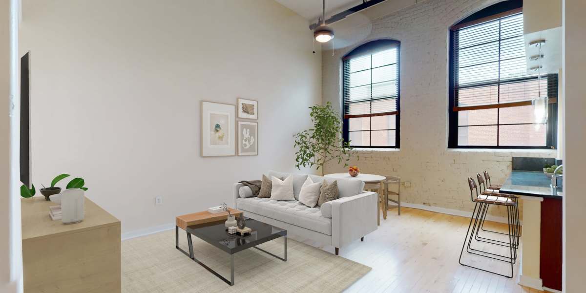 Wooden-floors and lots of natural lighting in a model home at Perry Street Lofts in Petersburg, Virginia