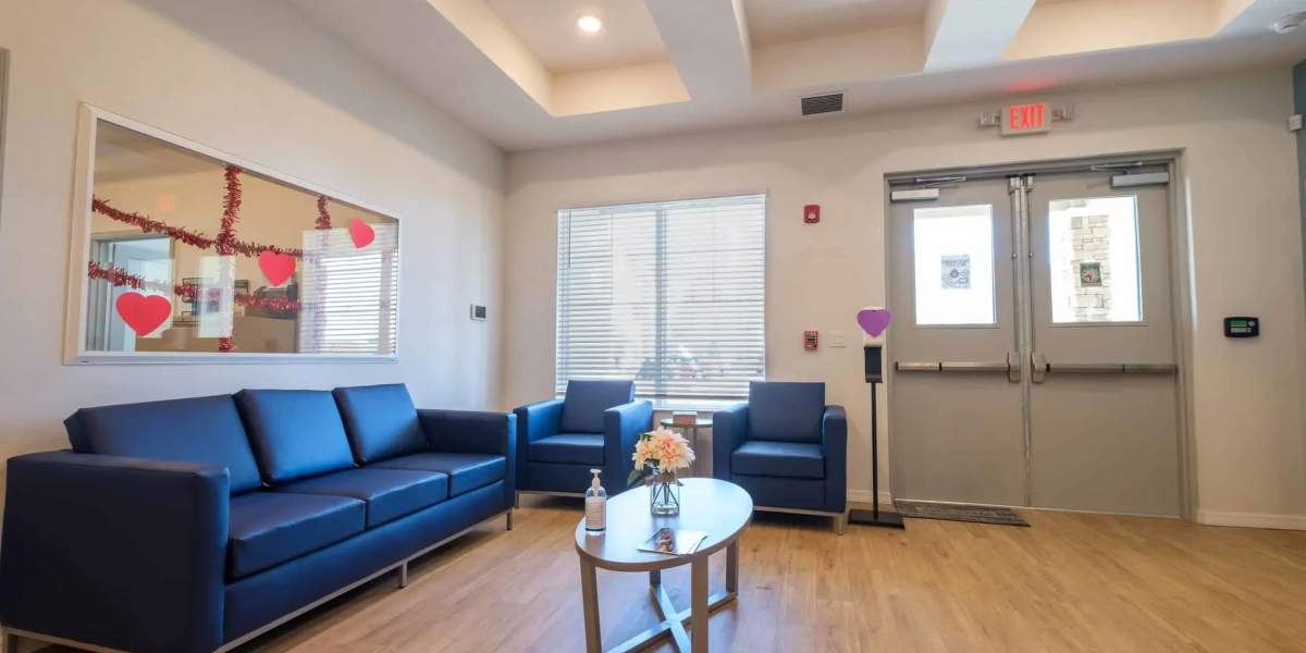 Wood-style flooring in the indoor lounge at Gannet Point in Kissimmee, Florida