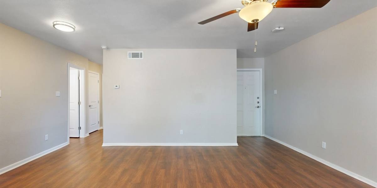 Spacious and well lit living room at Bella Vista in Austin, Texas