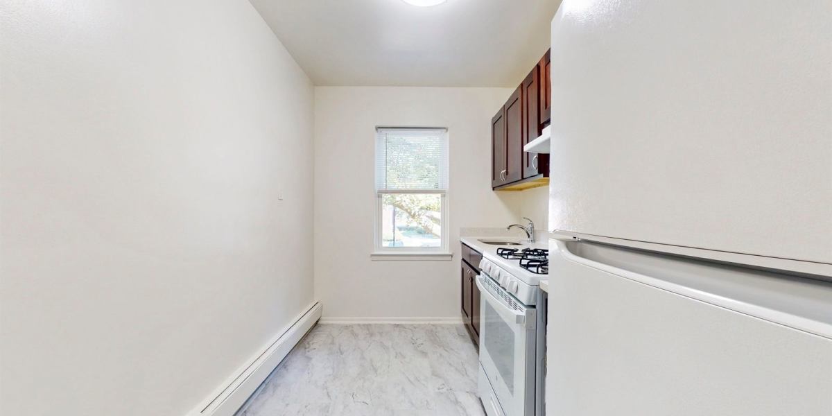 Bright and spacious kitchen at Cherry Garden Apartments in Roselle, New Jersey