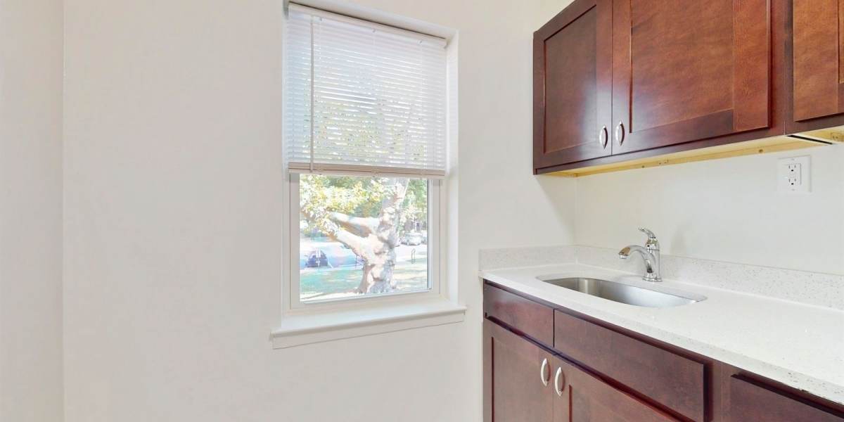 Window to the outside community space at Cherry Garden Apartments in Roselle, New Jersey