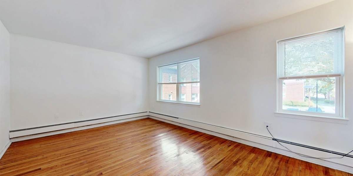 Spacious and well lit room at Cherry Garden Apartments in Roselle, New Jersey