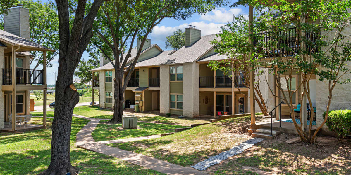 Trees outside at Courtyard Apartments And Storage in Granbury, Texas