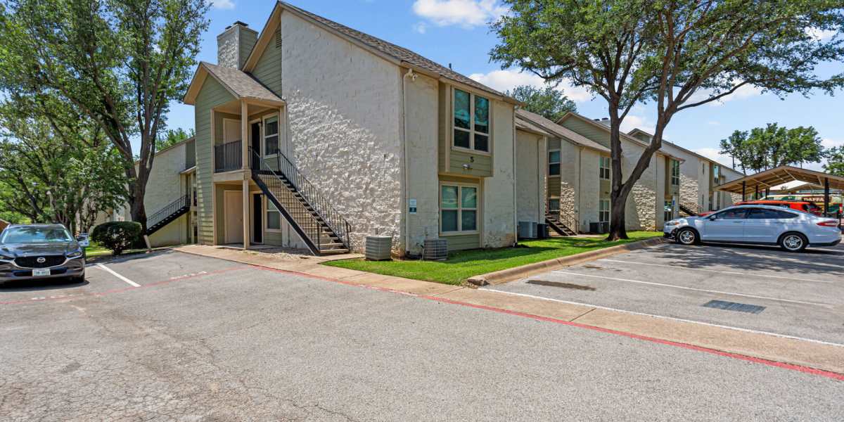 parking lot 5 Courtyard Apartments And Storage in Granbury, Texas