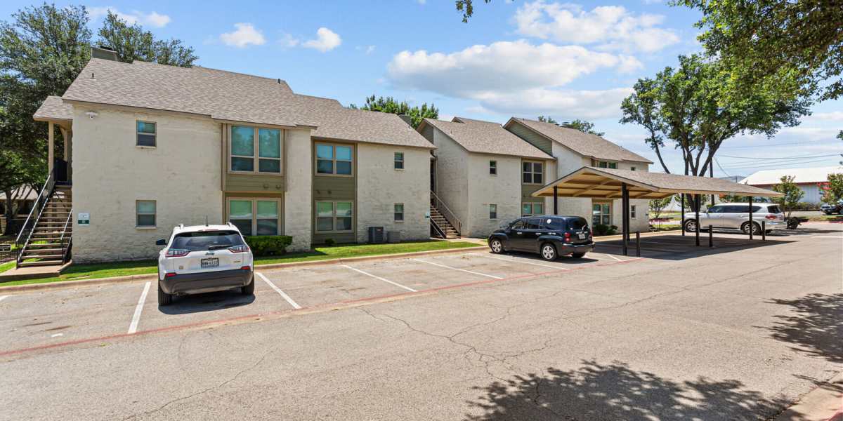 parking lot 4 Courtyard Apartments And Storage in Granbury, Texas