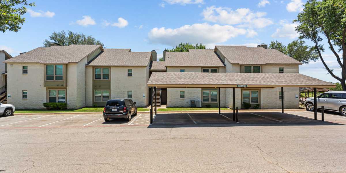 parking lot 3 Courtyard Apartments And Storage in Granbury, Texas